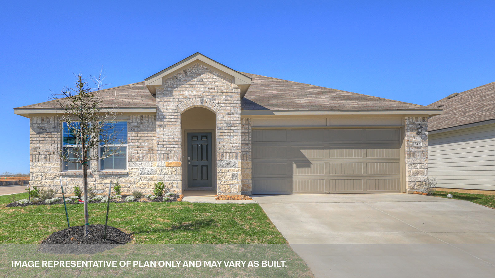Arroyo Ranch Lakeway B elevation with a brick and stone exterior.