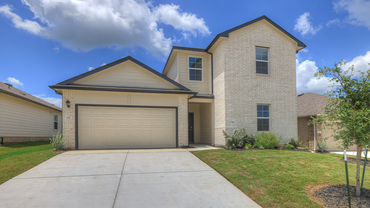 Midland Elevation A, two story with brick exterior, 3 front windows, and 2 car garage.