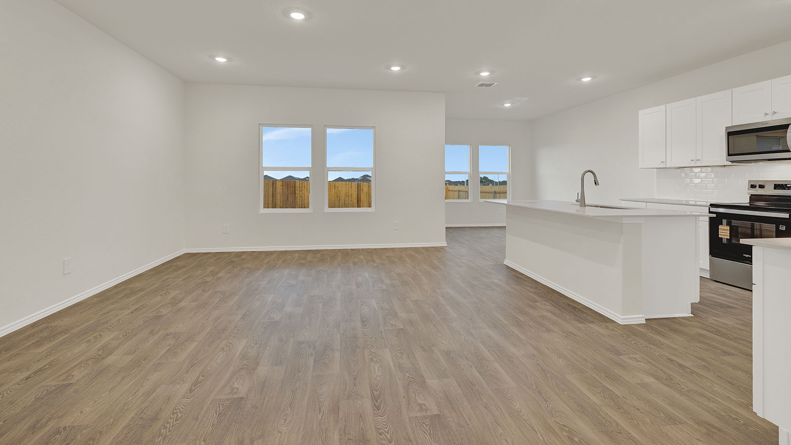 Living room opening to the kitchen.