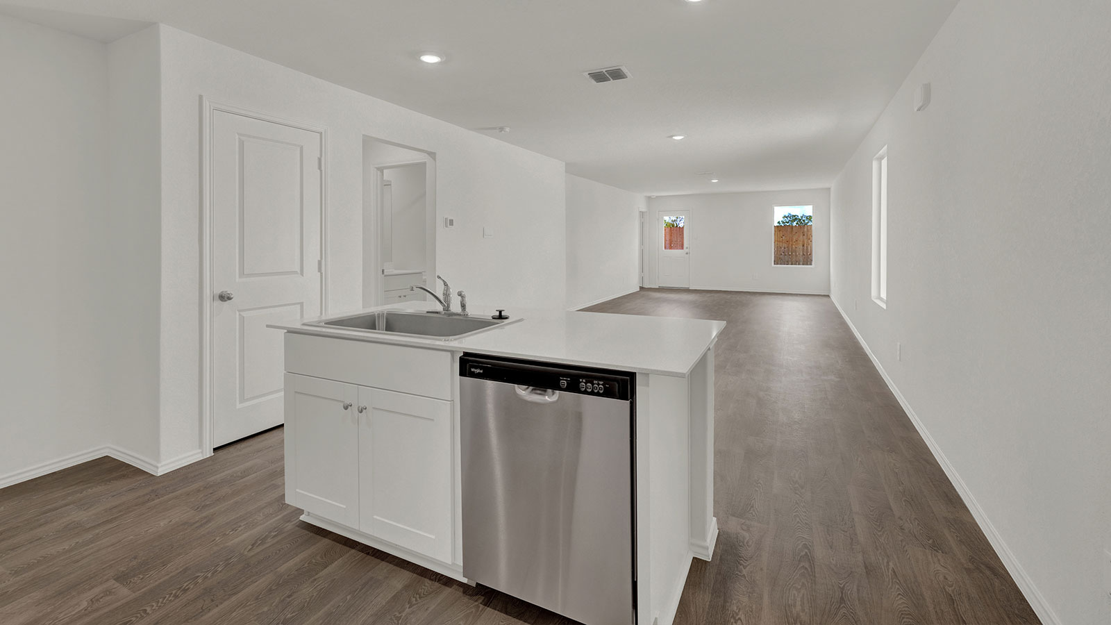 Kitchen island overlooking the dining room and living room.