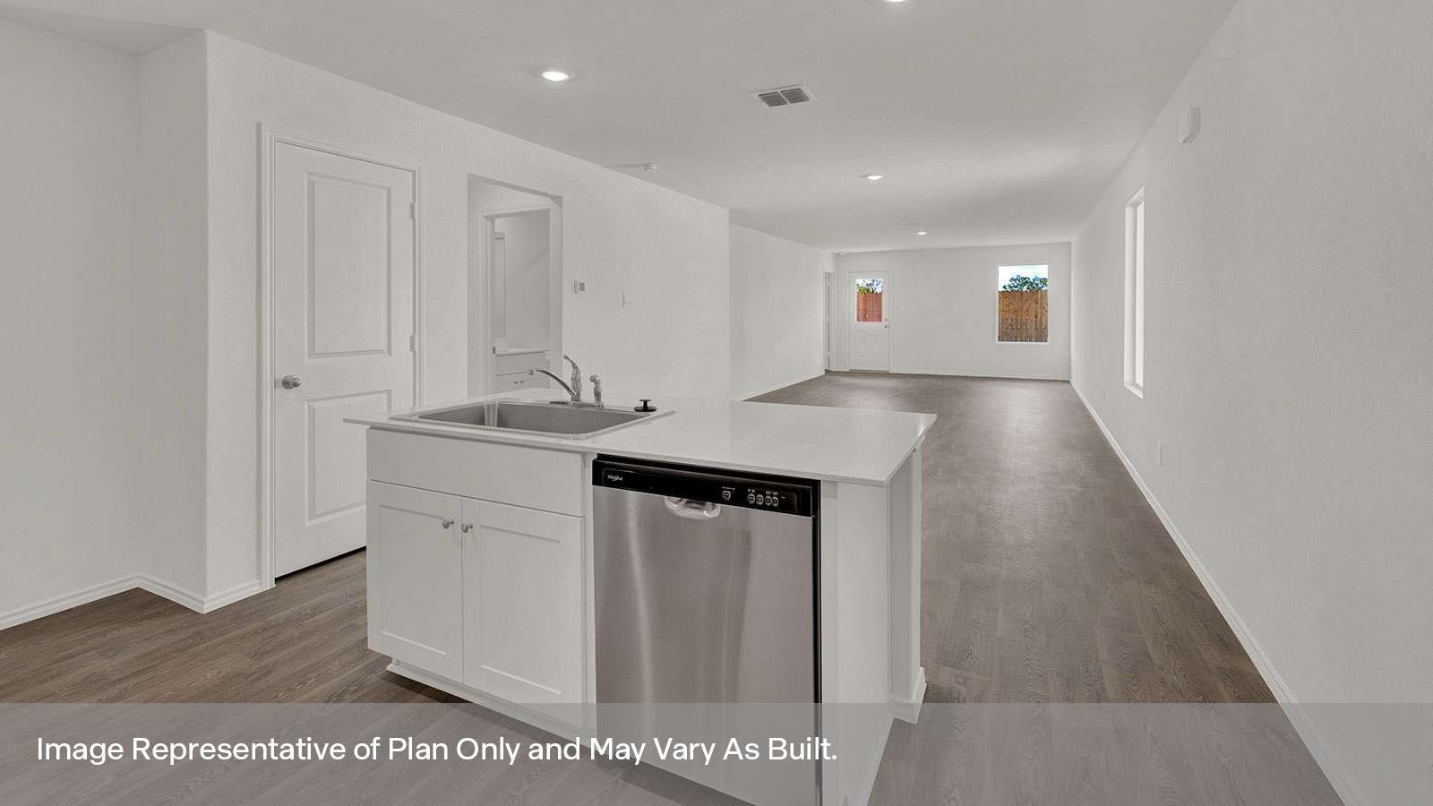 Kitchen island with stainless steel kitchen sink.