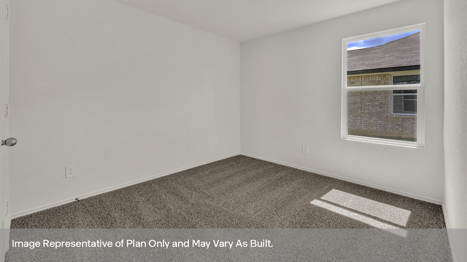 Secondary bedroom with carpeting and one window.