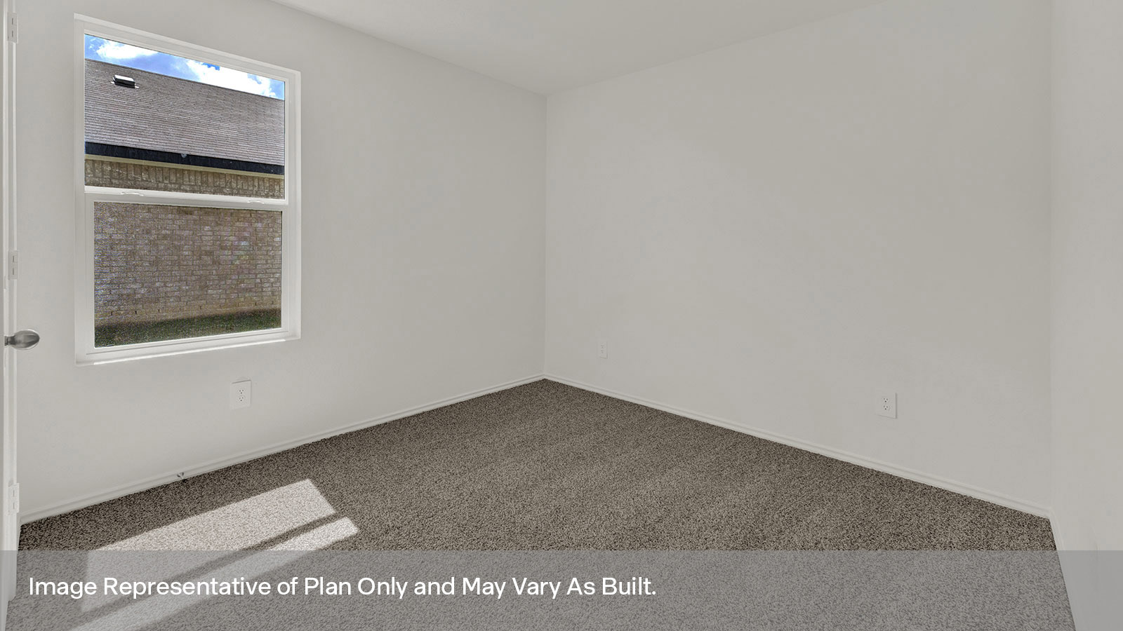 Secondary bedroom with carpeting and one window.