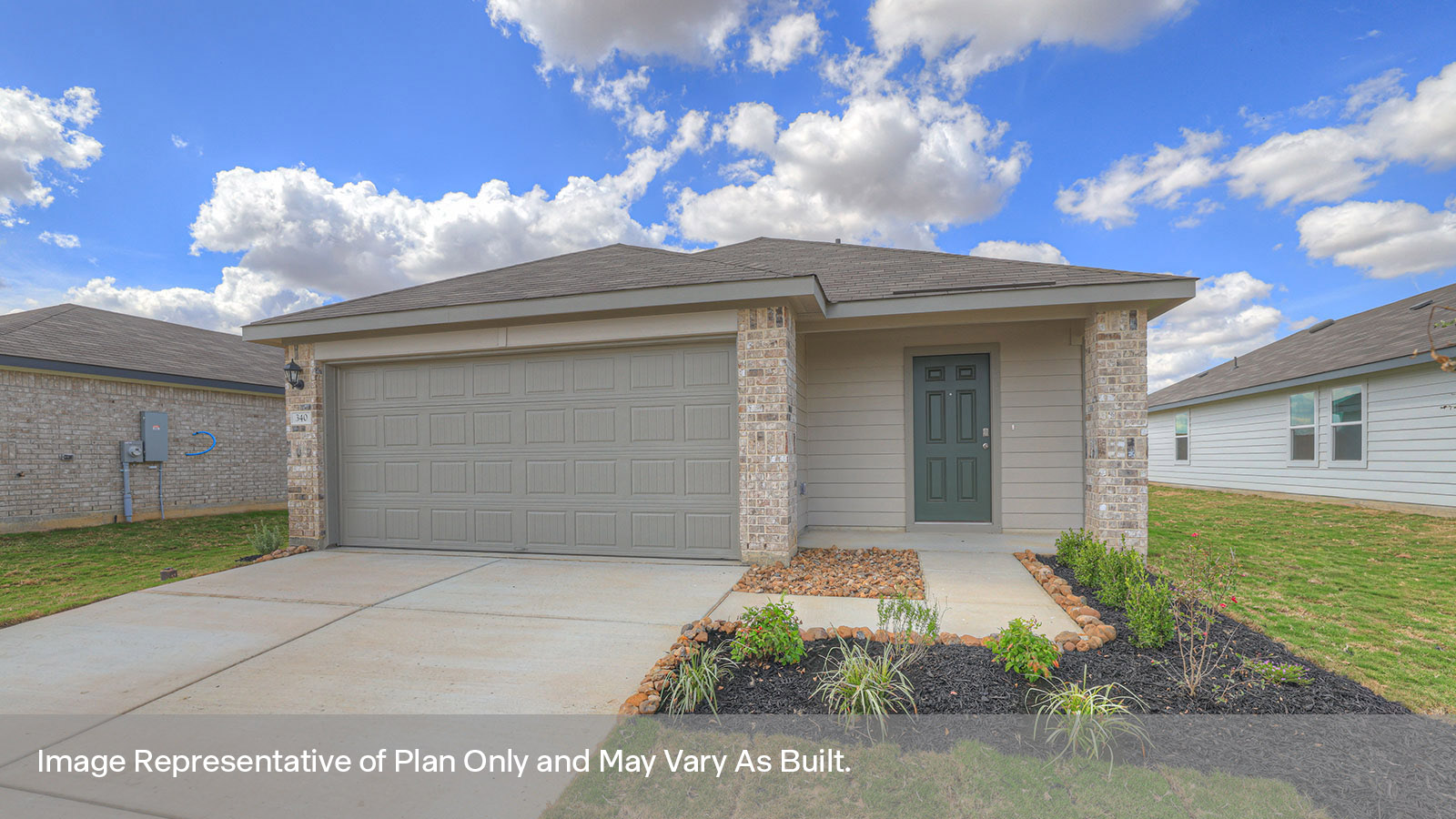 Single-story farmhouse with 2 car garage.