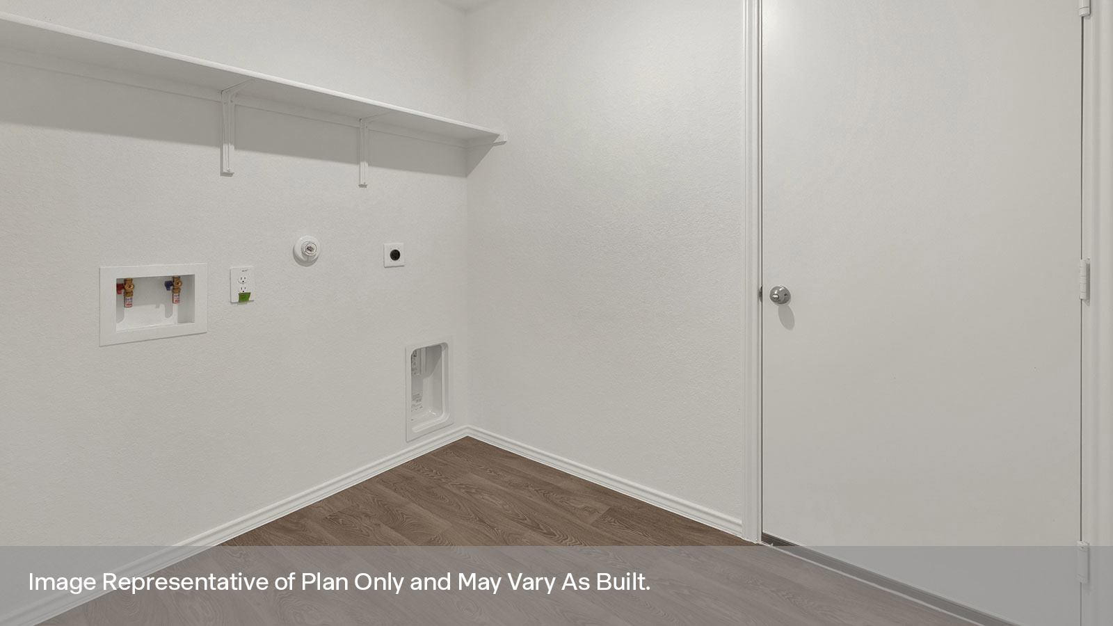 Utility room with washer/dryer connections and wooden shelving.