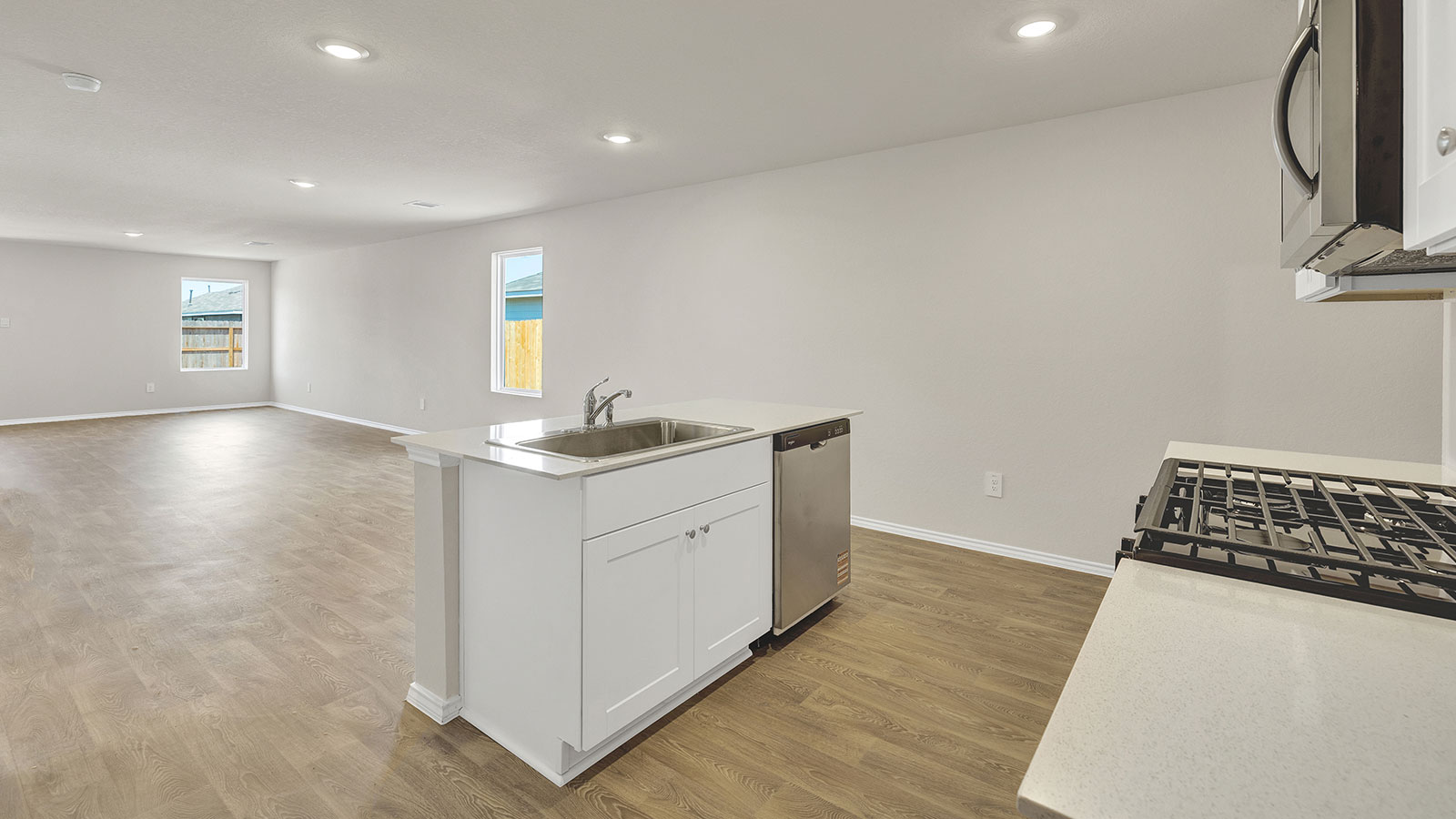 Dining room opening to the kitchen.