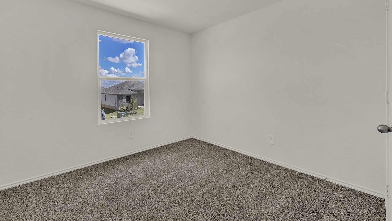 Bedroom with carpeting and closet.