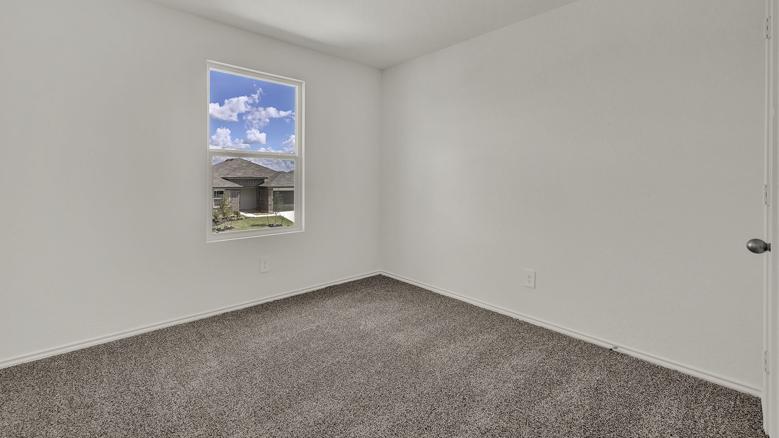 Bedroom with carpeting and closet.