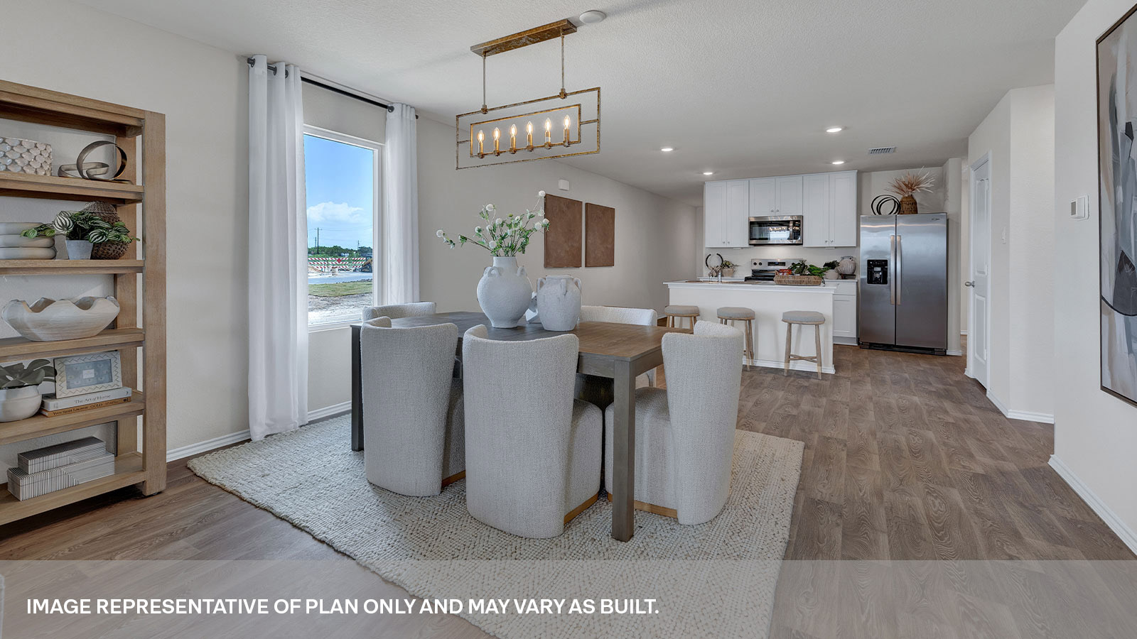Dining room opening to the kitchen.