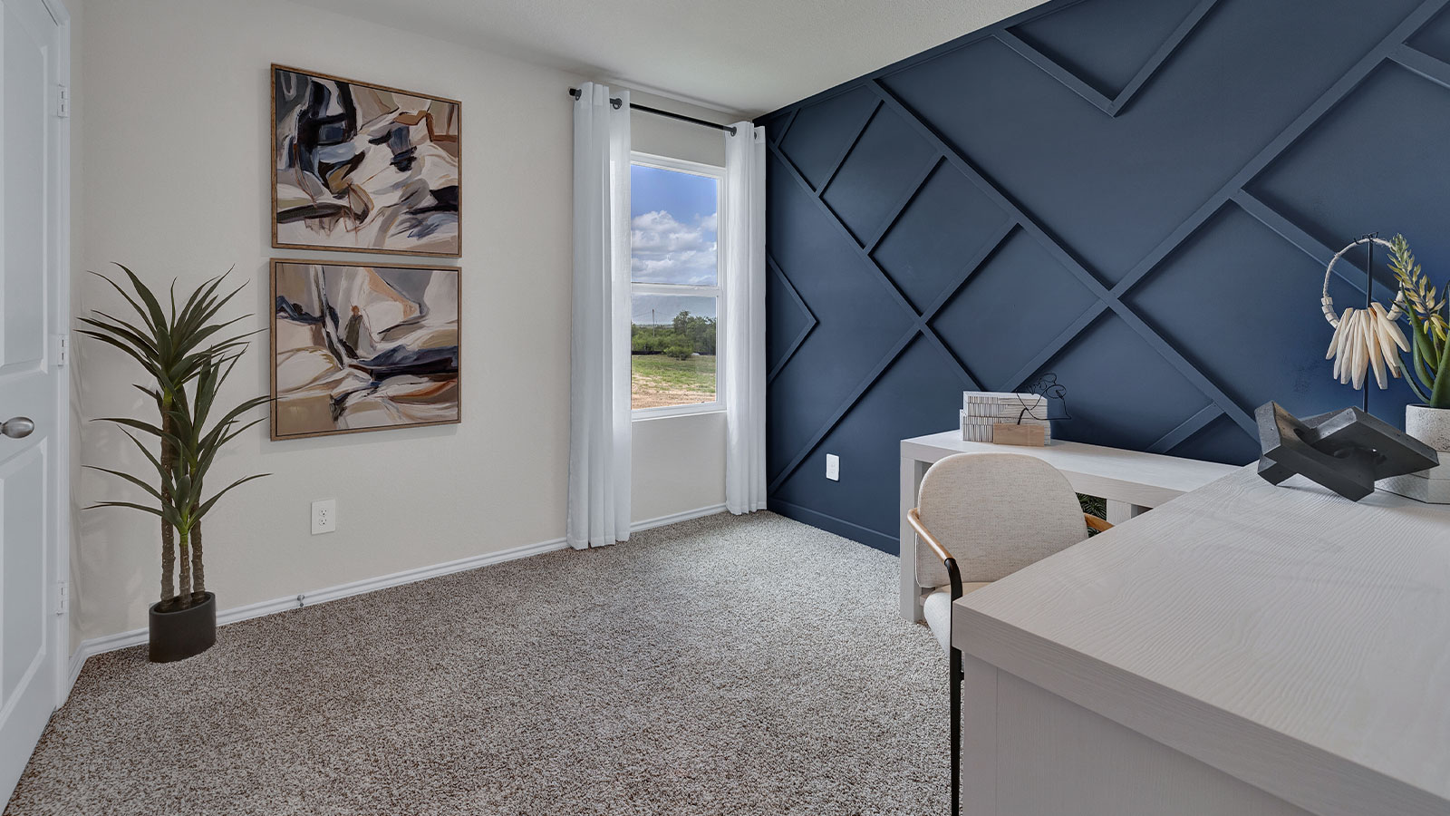 Bedroom with carpeting and one window.