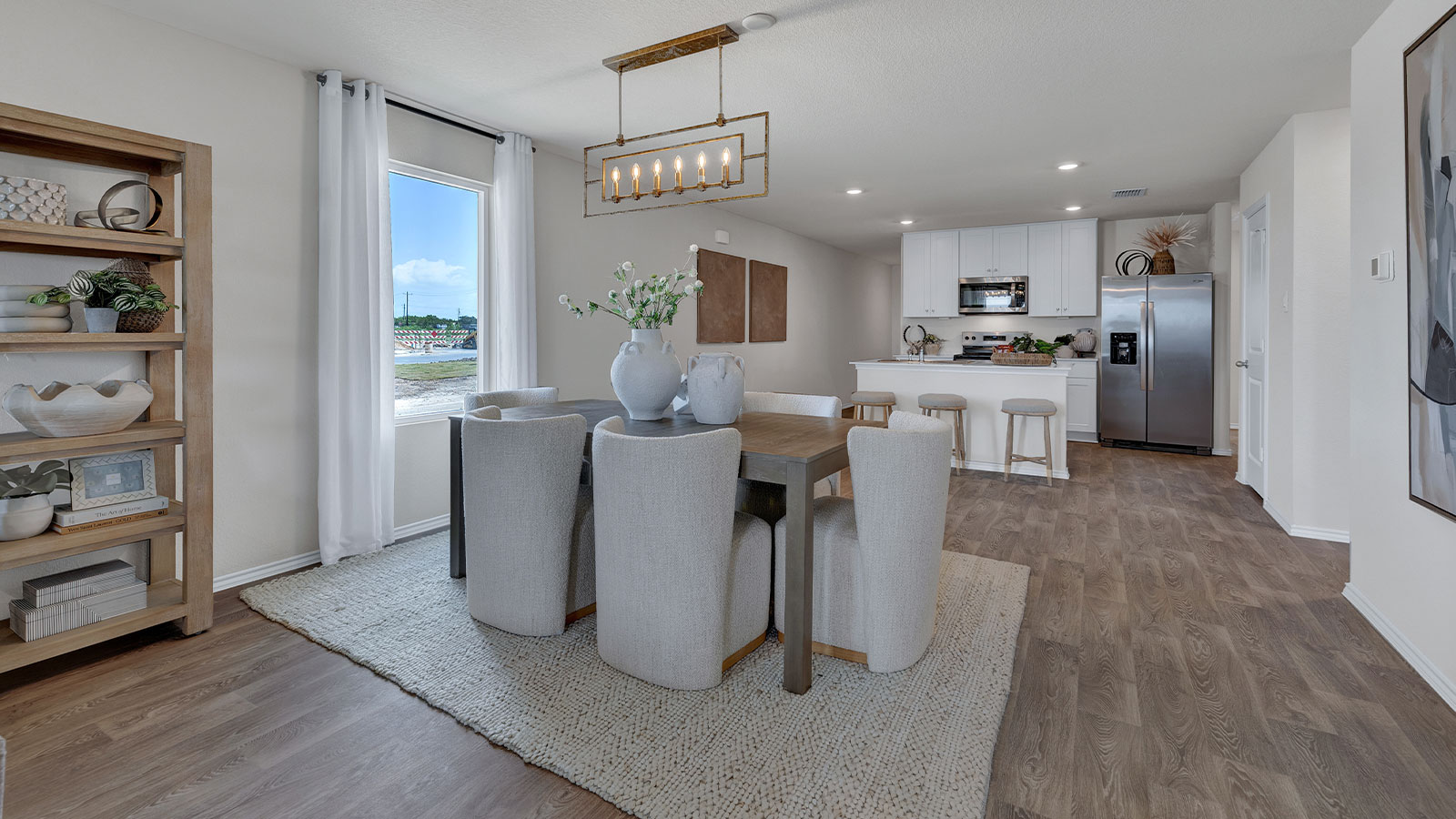 Dining room opening to the kitchen.