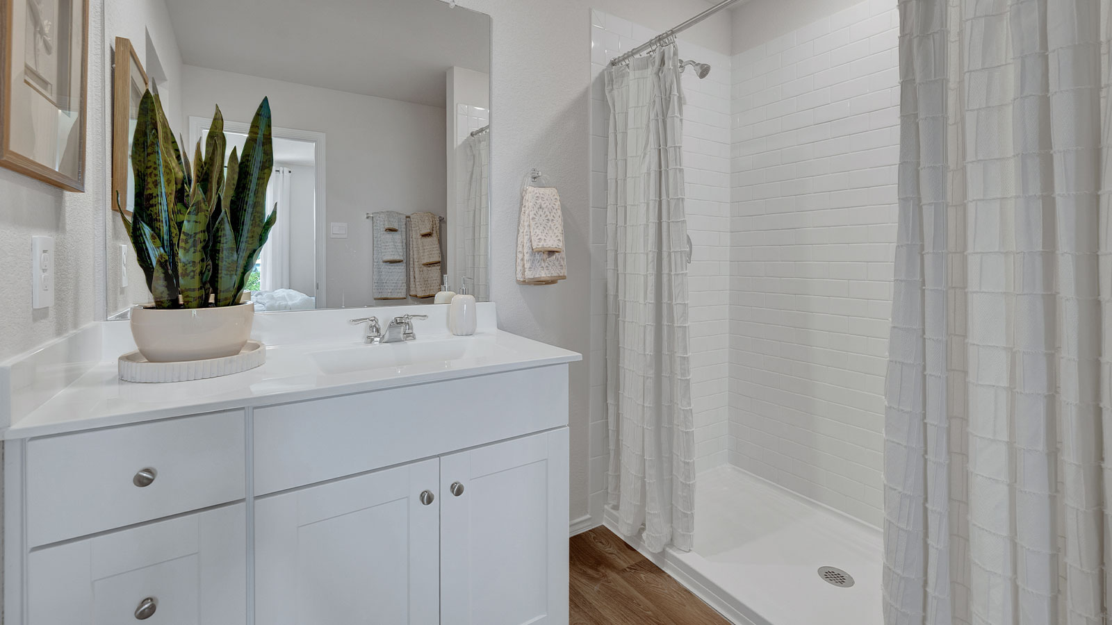 Main bathroom with single-sink vanity.