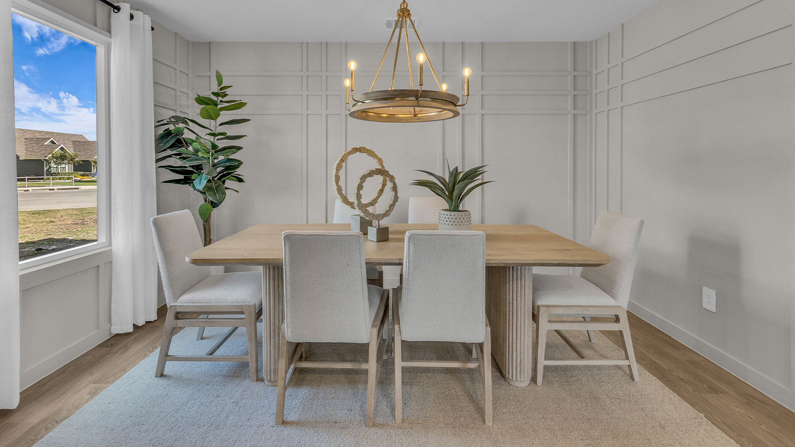 Dining room and living room with vinyl flooring and 1 window.