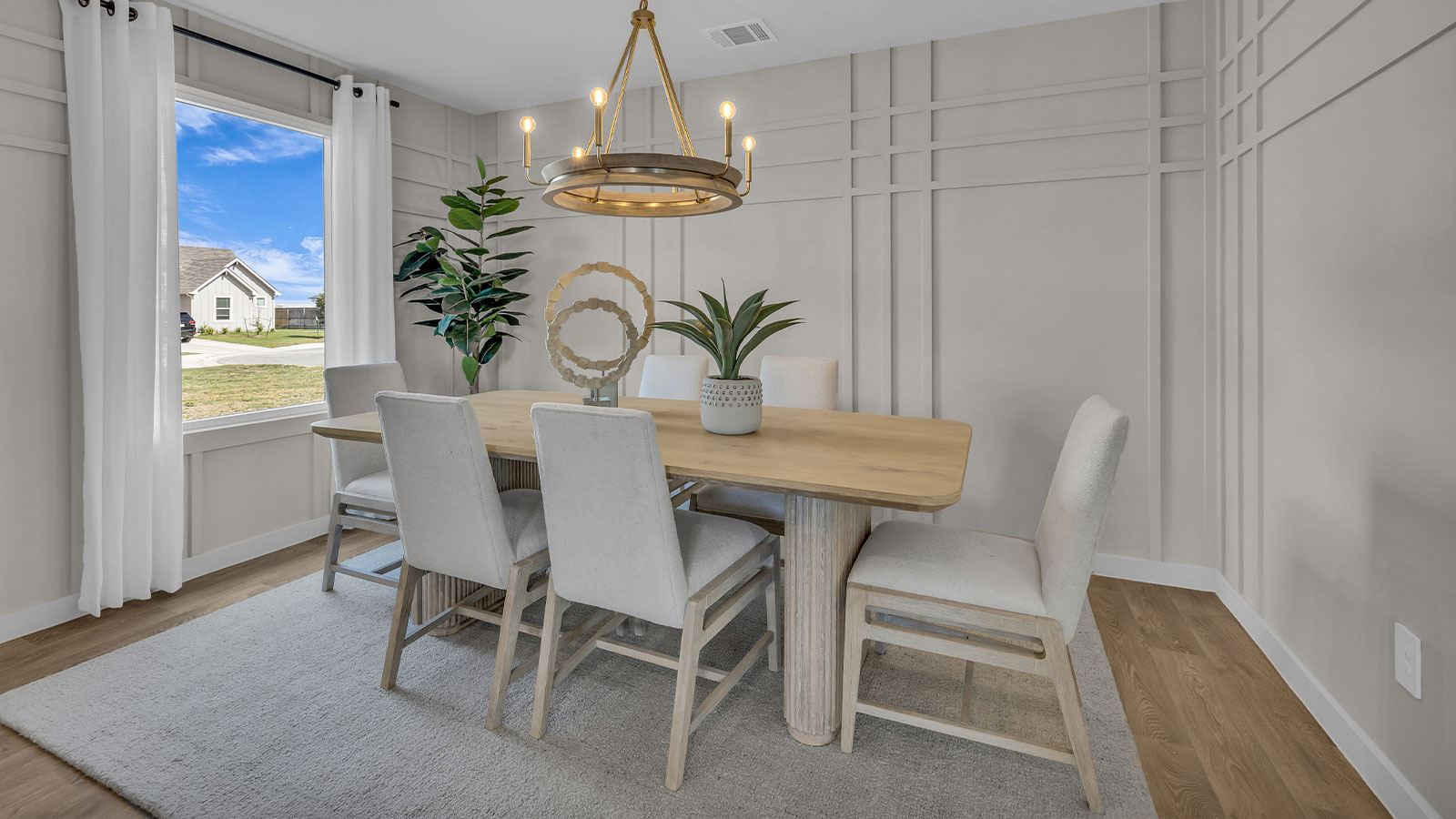 Dining room and living room with vinyl flooring and 1 window.
