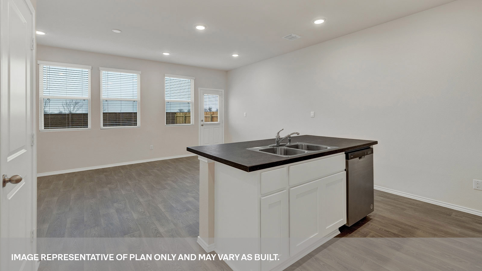 Kitchen island overlooking the living room and dining.