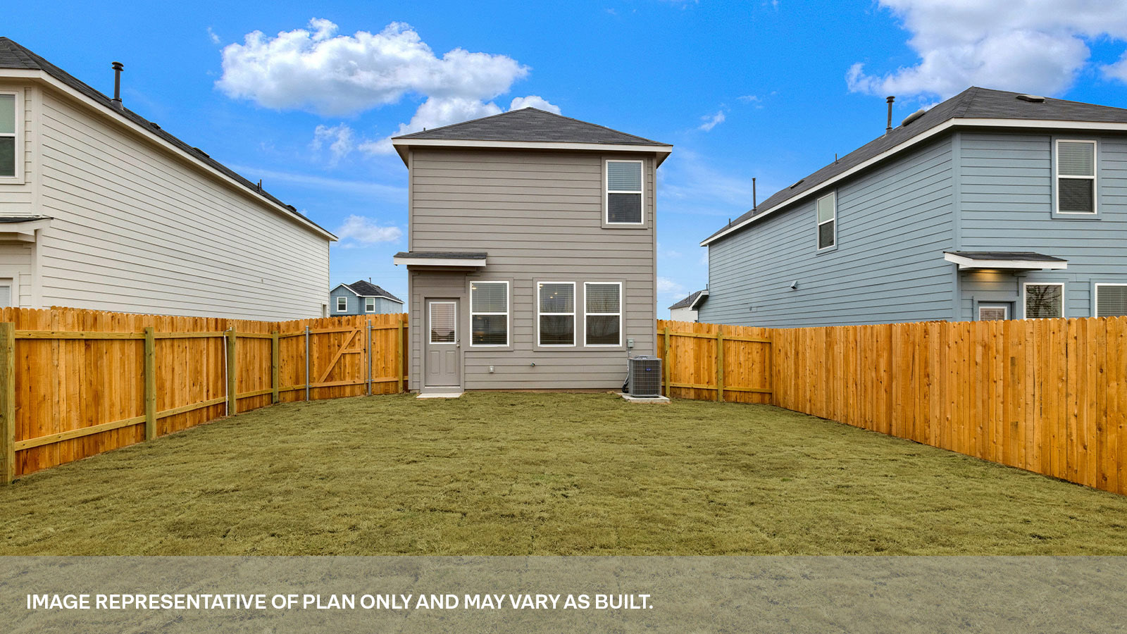 Exit back door with 4 windows and sodded backyard.