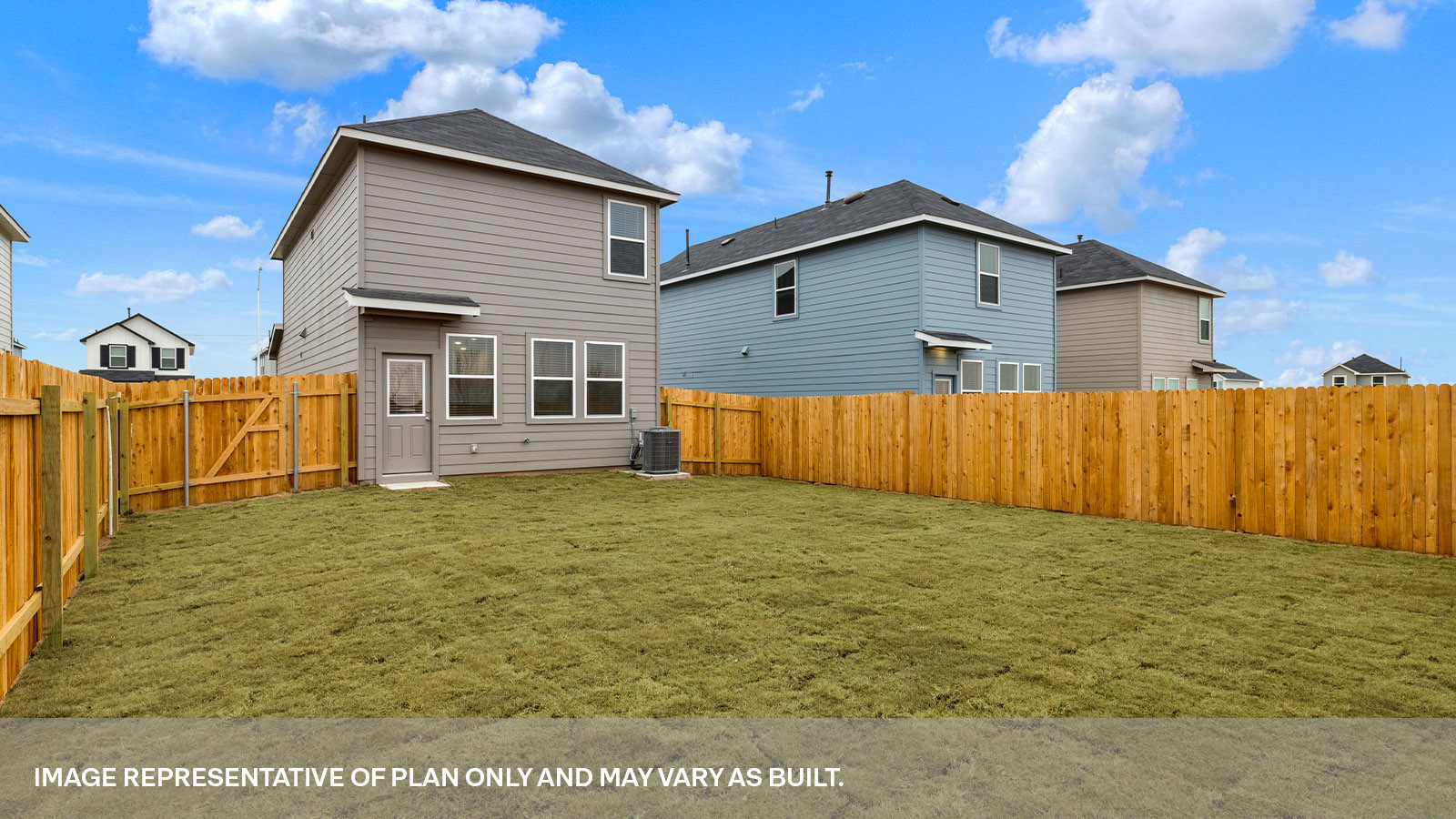 Exit back door with 4 windows and sodded backyard.