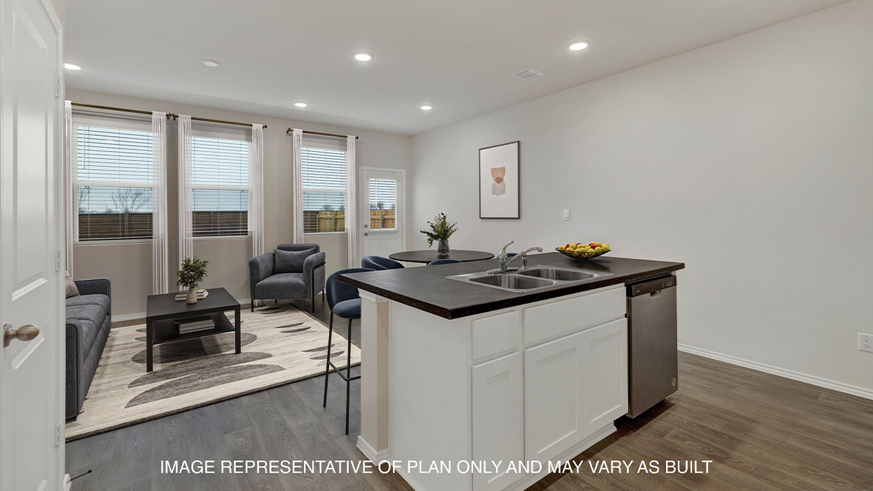Kitchen island overlooking the living room and dining.