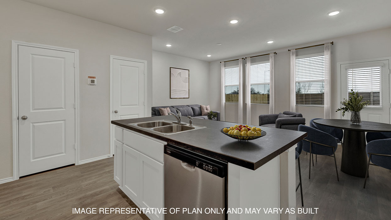Kitchen island overlooking the living room and dining.