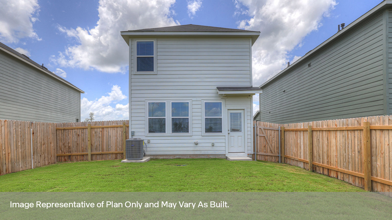 Fully sodded back yard and privacy fence.