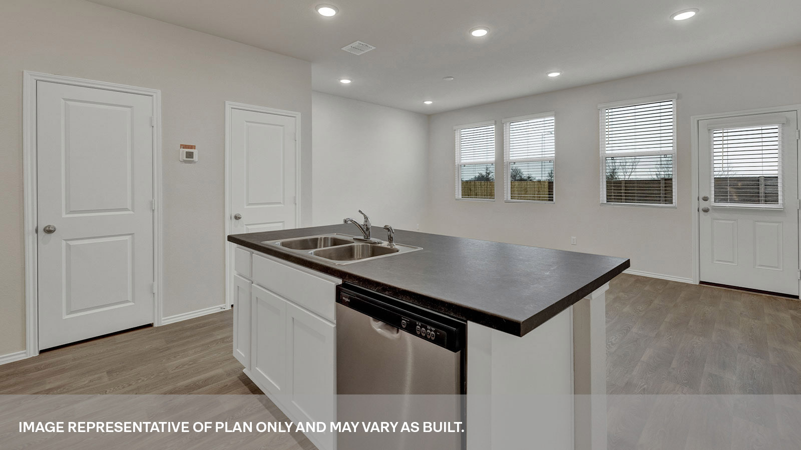 Kitchen island overlooking the living room and dining.