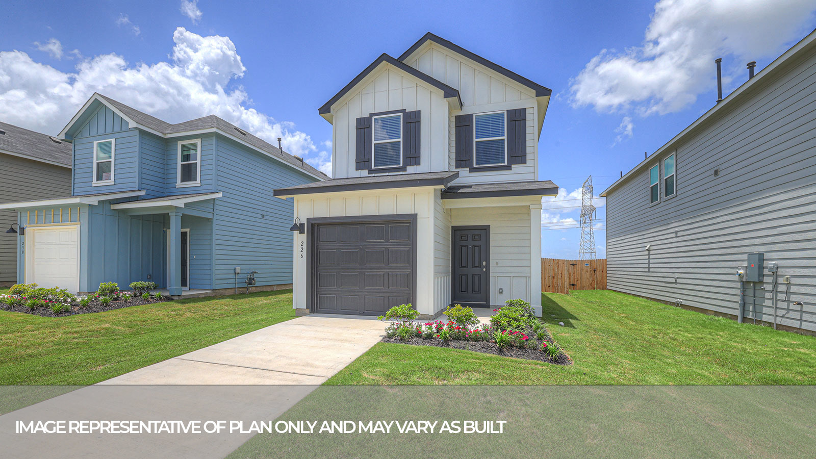 Two-story farmhouse exterior with two windows and 1 car garage.
