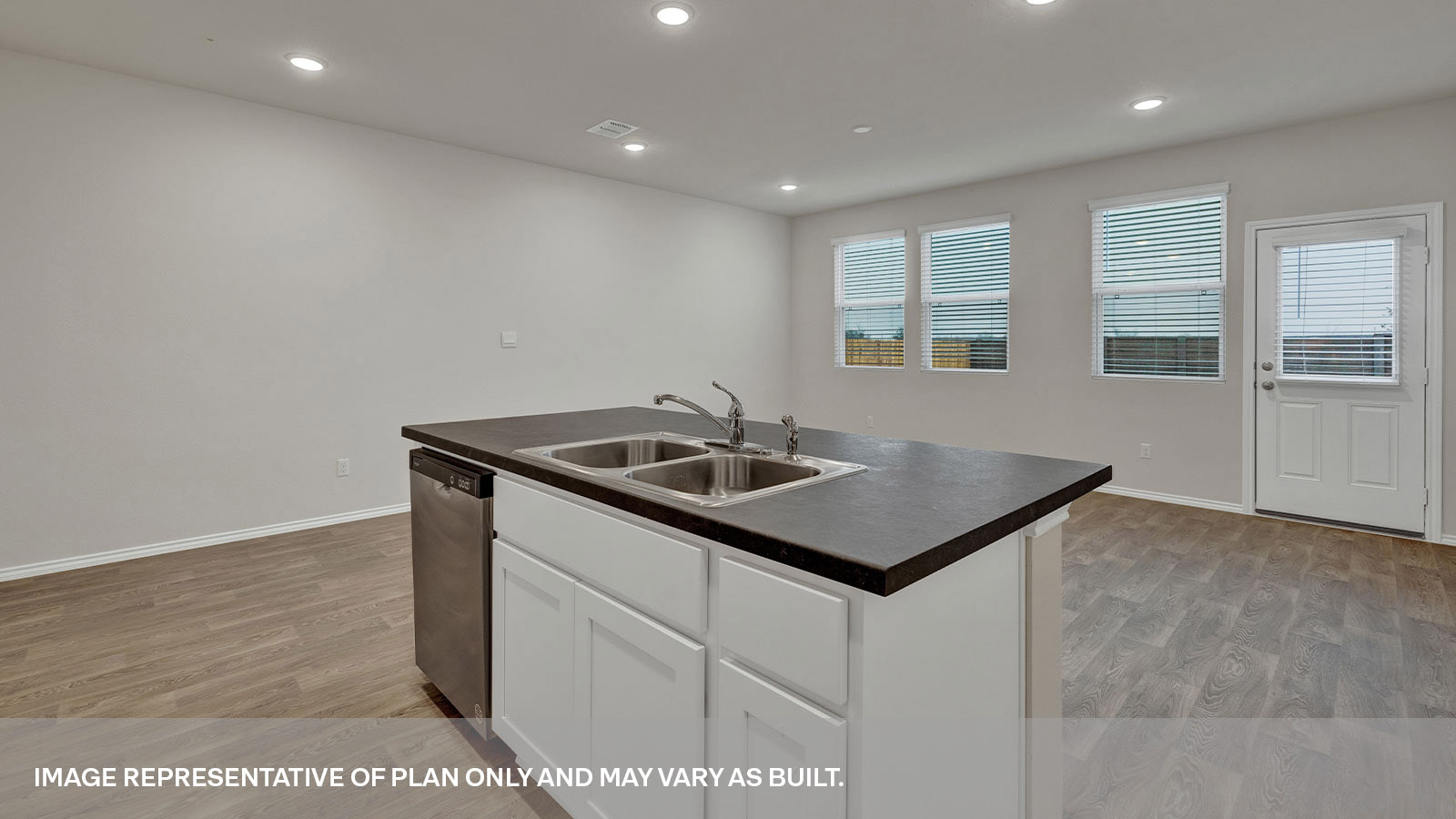 Kitchen island, entry hallway and dining area.