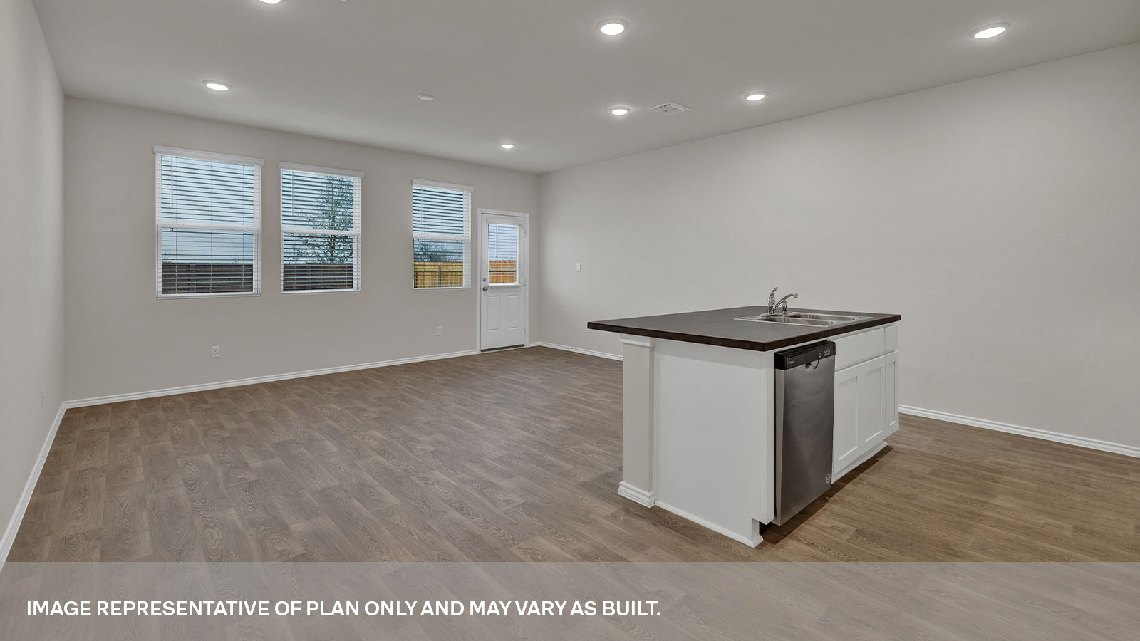 Kitchen island,  living room, entry hallway and dining area.
