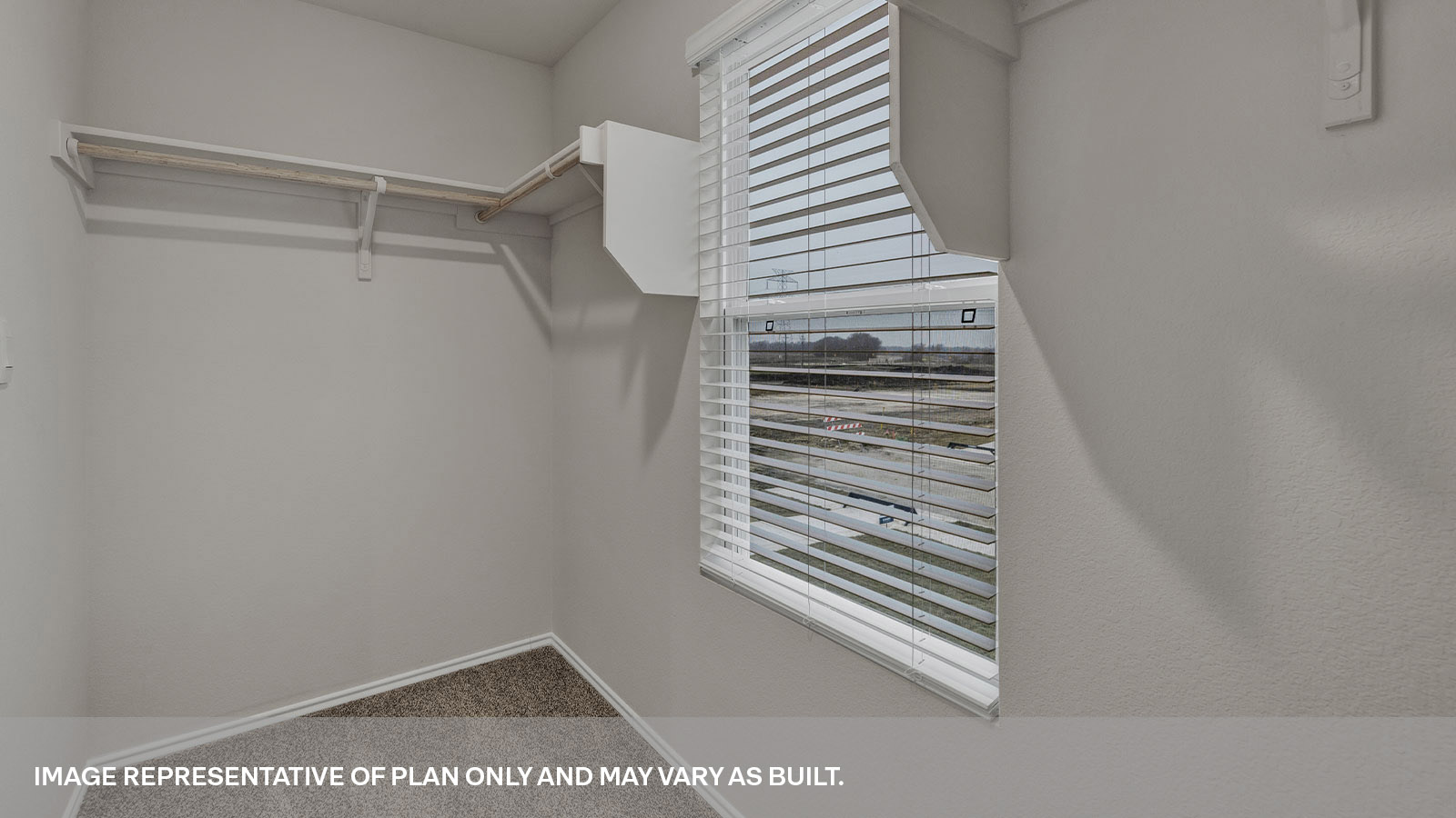 Bedroom 2 with carpeting with one window.