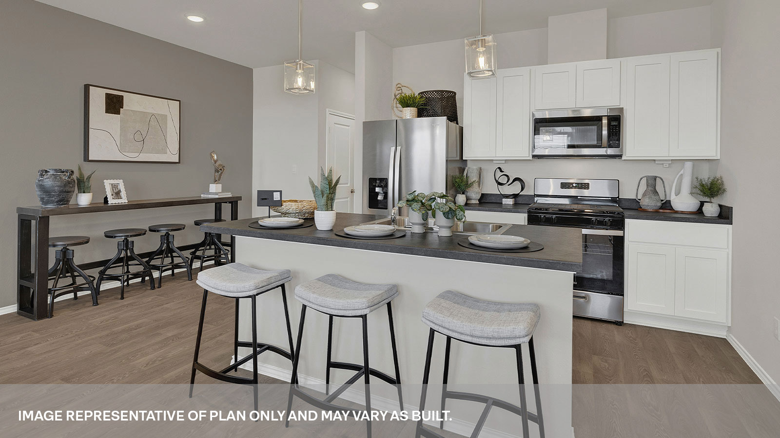 Kitchen with kitchen island and white cabinets.