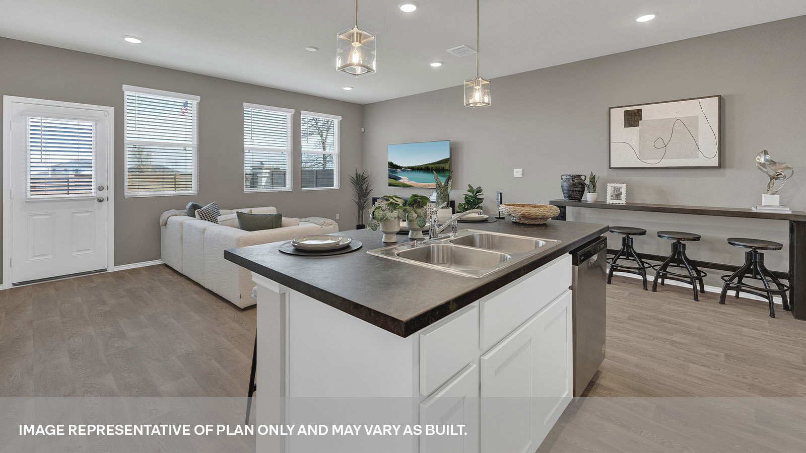 Kitchen island, entry hallway and dining area.
