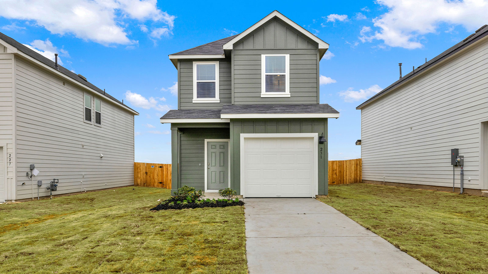 Green Siding with White door