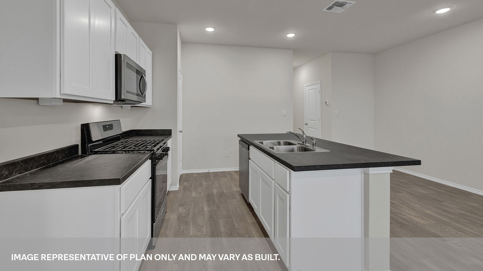 Kitchen island, entry hallway and dining area.