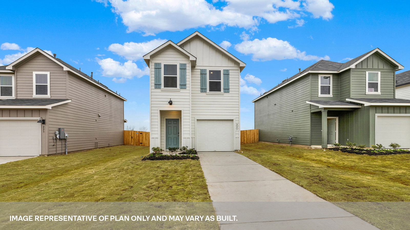 Two-story farmhouse exterior with two windows and 1 car garage.