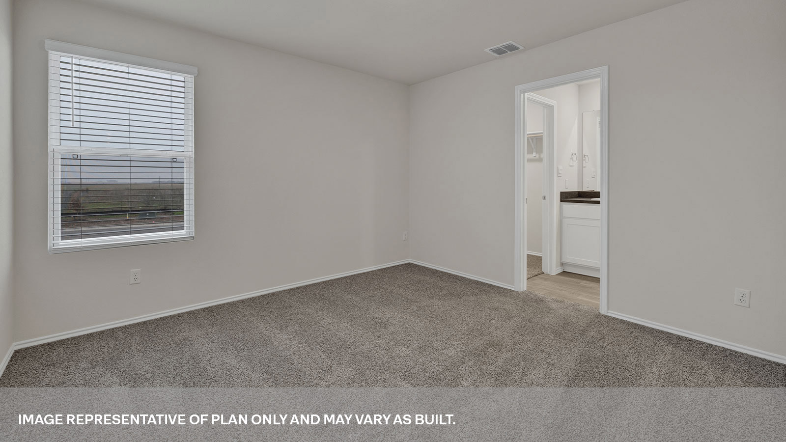 Main bedroom with carpeting with one window and entry to the bathroom and closet.