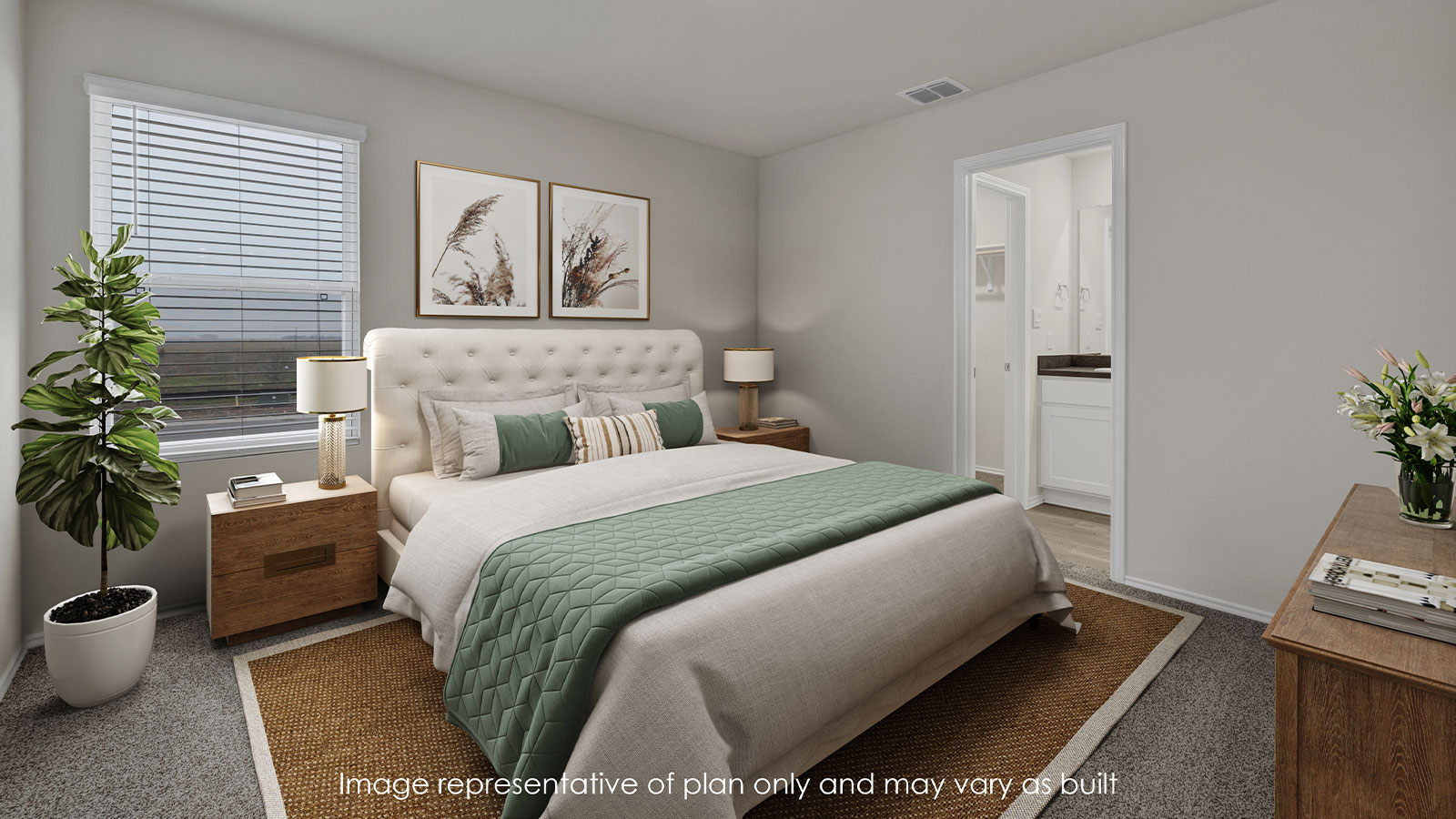 Staged main bedroom with bed, side tables, rug, and decor.
