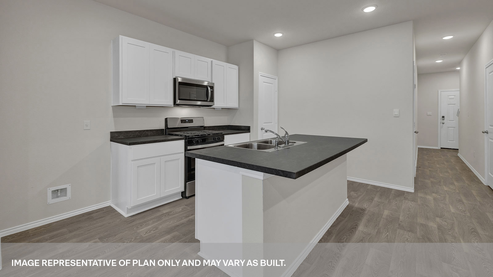Kitchen island, entry hallway and dining area.