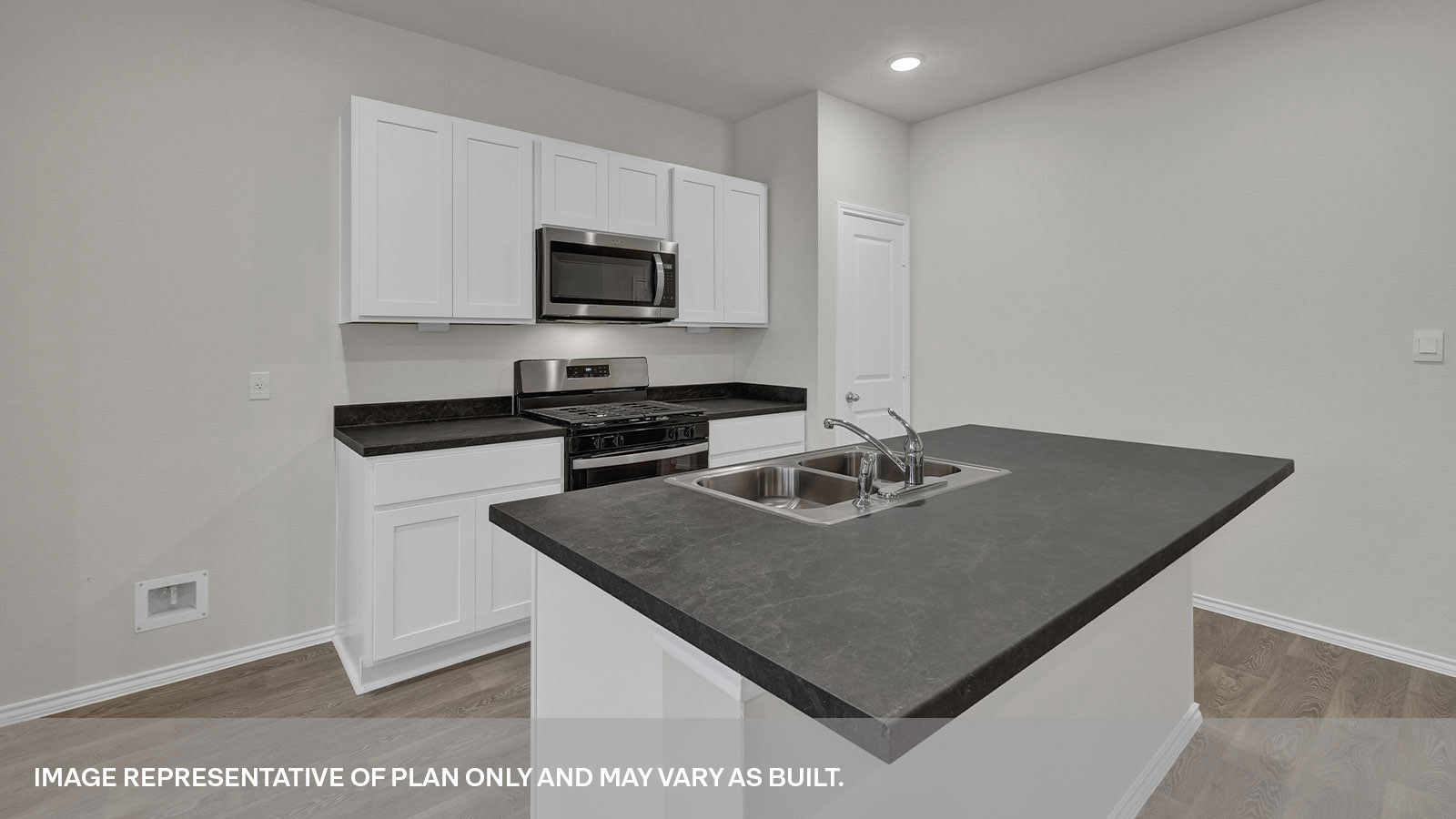 Kitchen island, entry hallway and dining area.