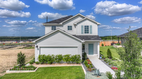 two story farmhouse home with blue shutters