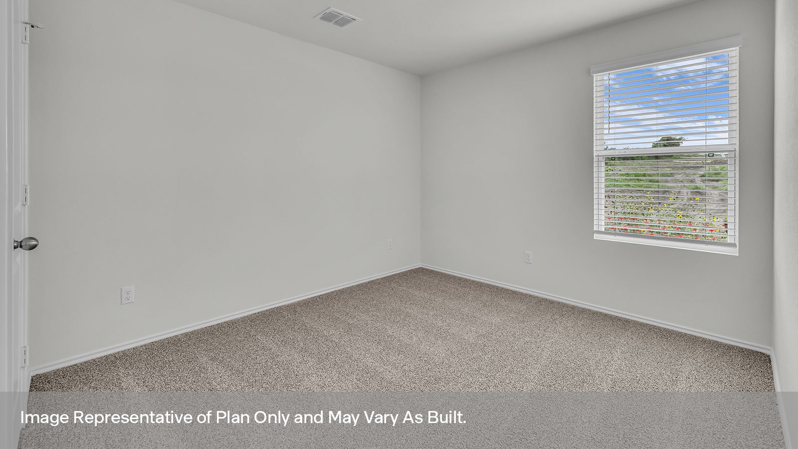 Secondary bedroom with carpeting and one window.
