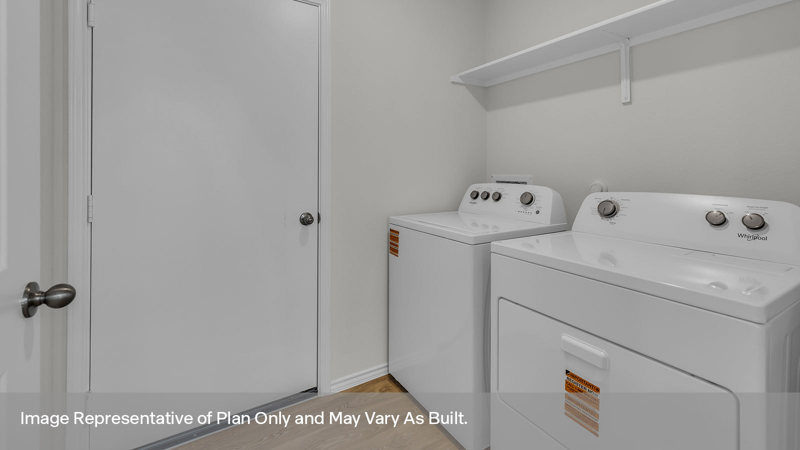 Laundry room with washer/dryer connections and wooden shelving.