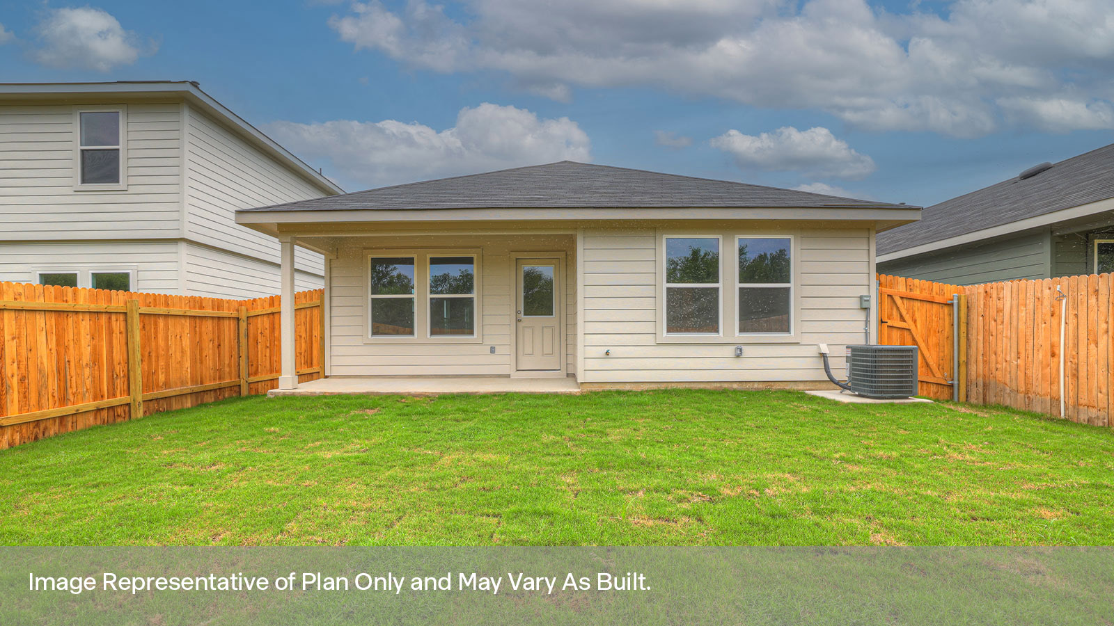 Covered patio with fully sodded backyard and privacy fence.