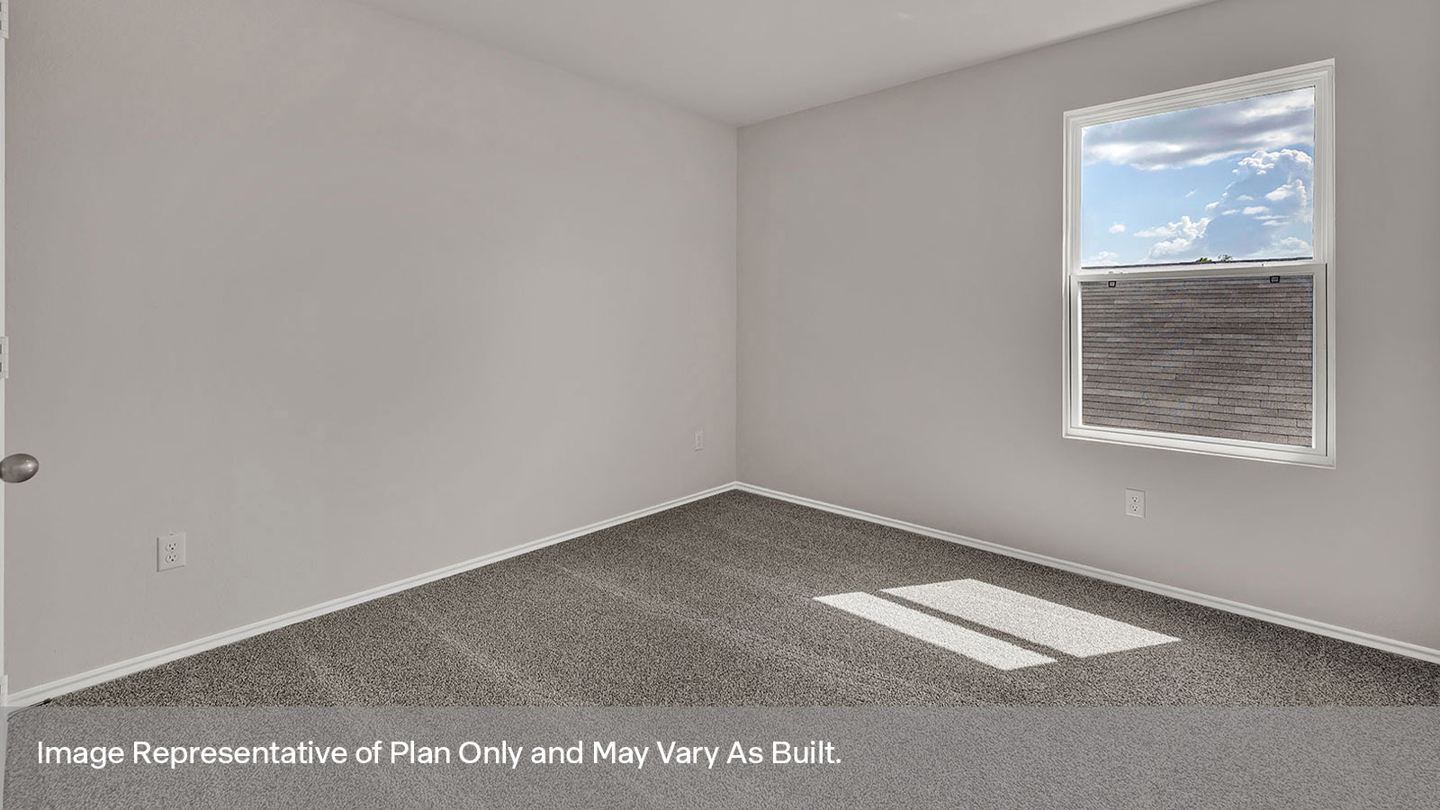 Secondary bedroom with carpeting and one window.