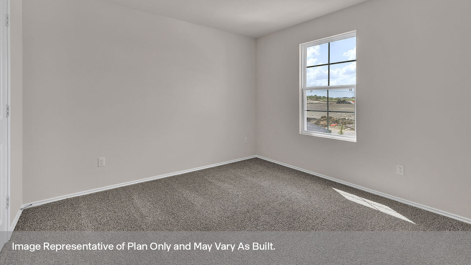 Secondary bedroom with carpeting and one window.