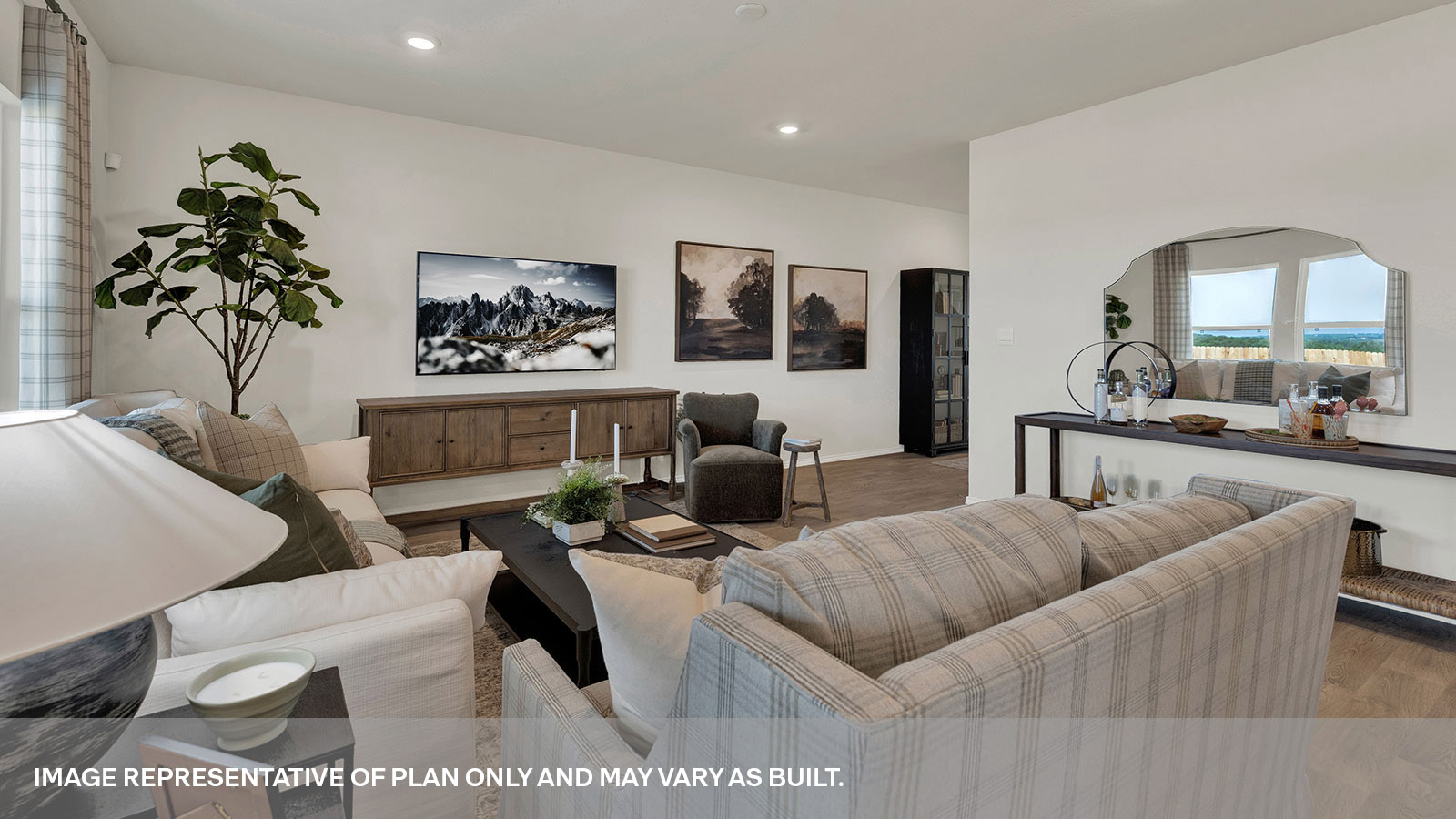 Living room with vinyl flooring and entry hallway.
