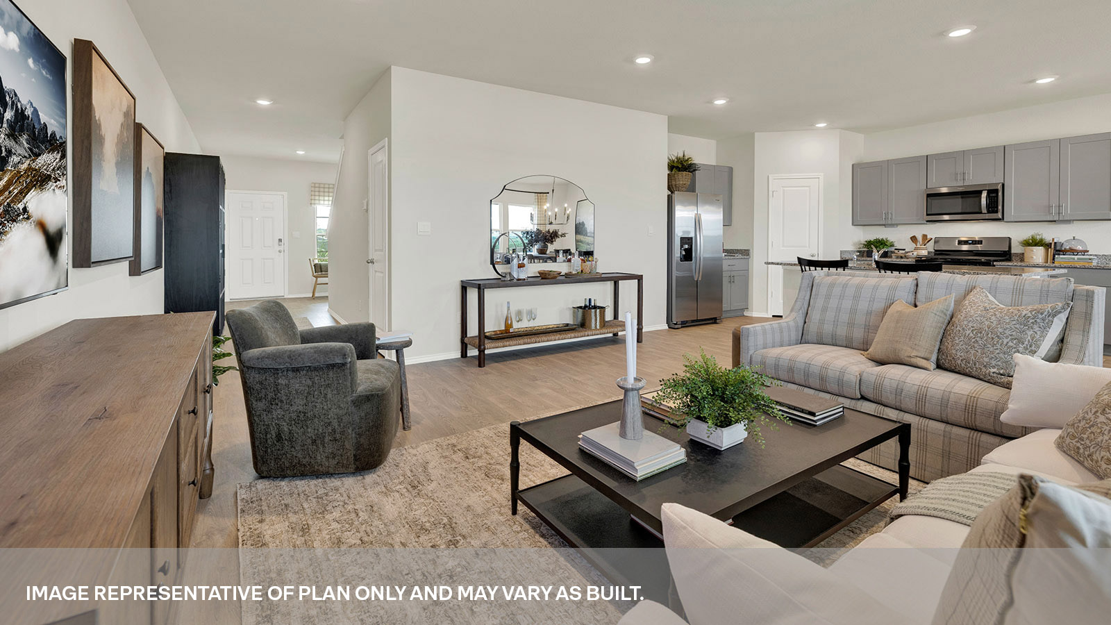 Living room with vinyl flooring and entry hallway.