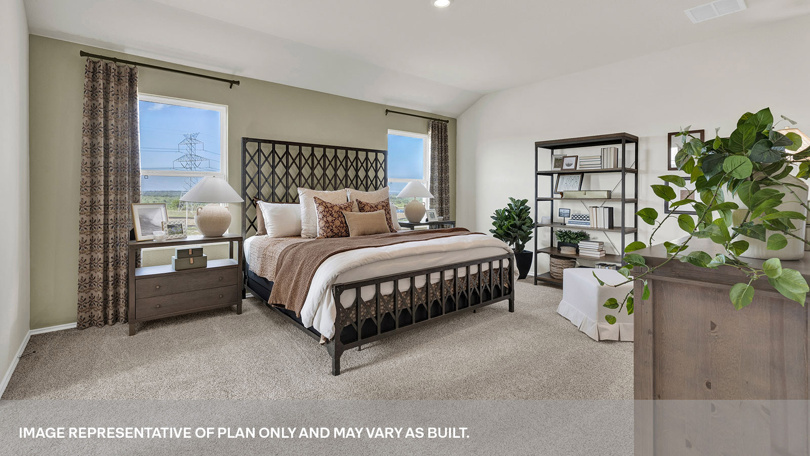 Main bedroom with carpeting and two windows.