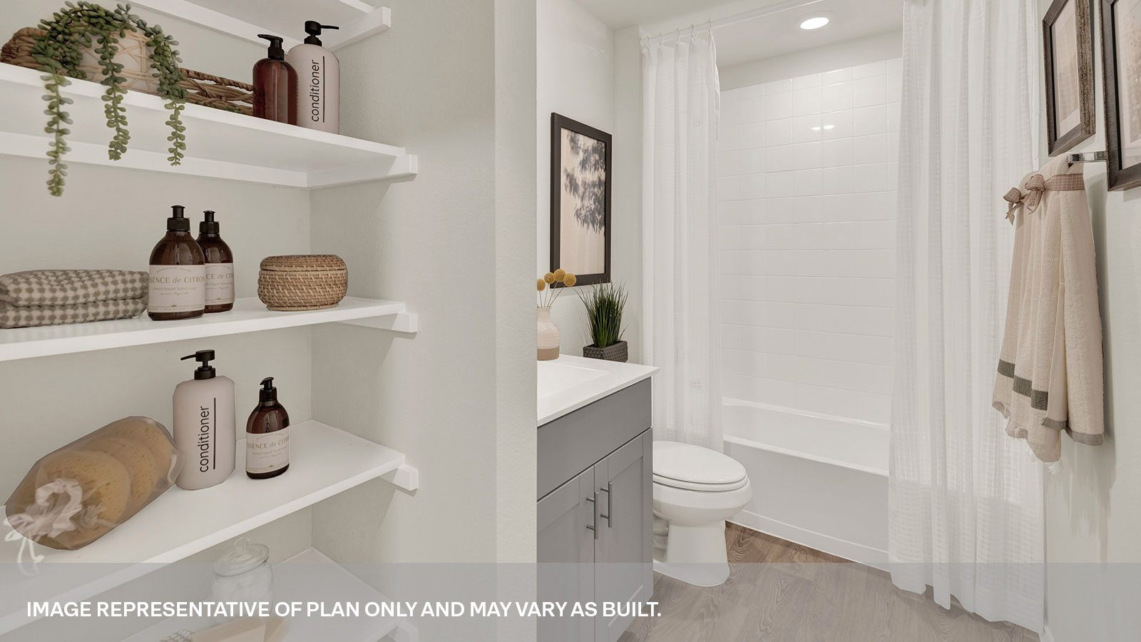 Hall bathroom with wooden shelving, toilet and tub.