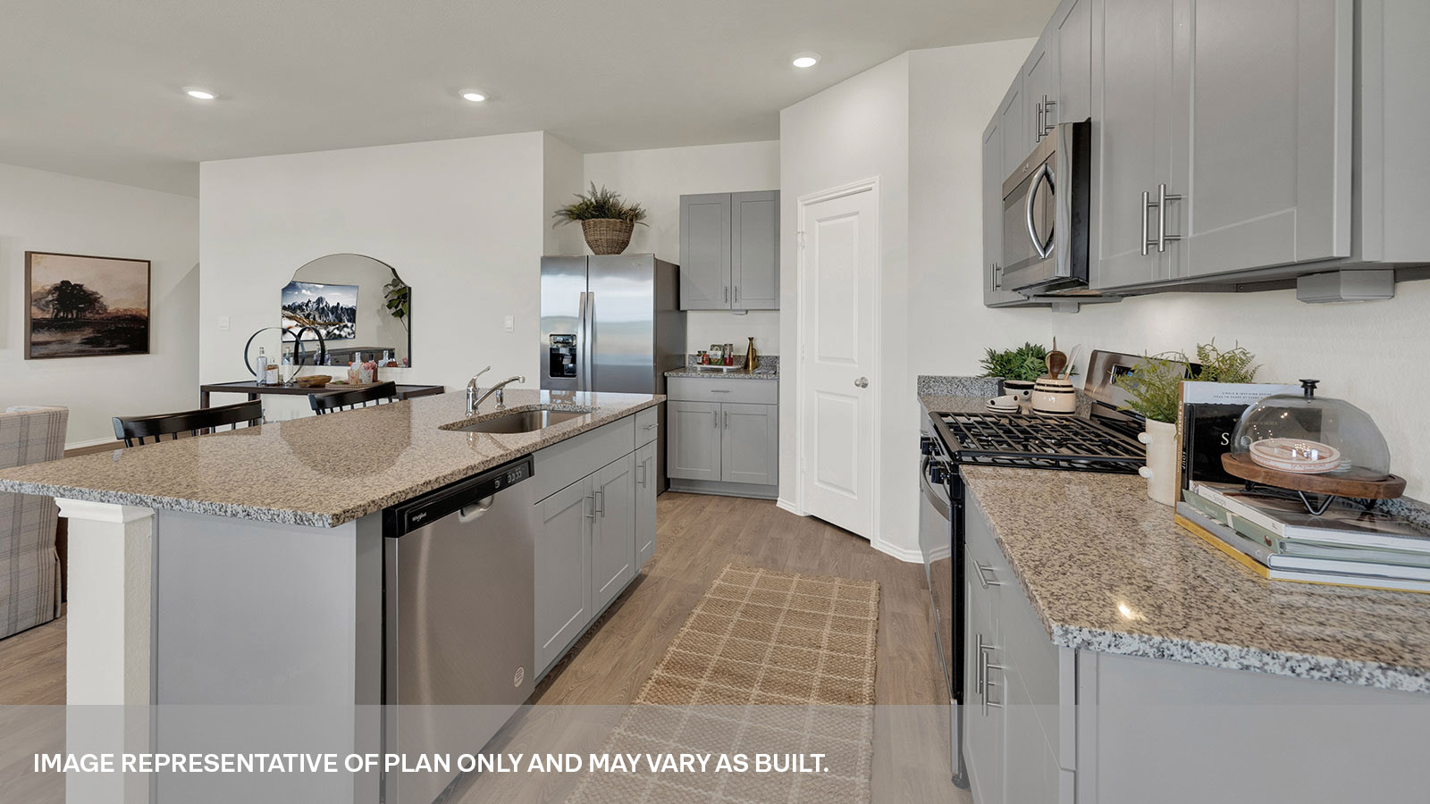 Kitchen with kitchen island overlooking the living room.