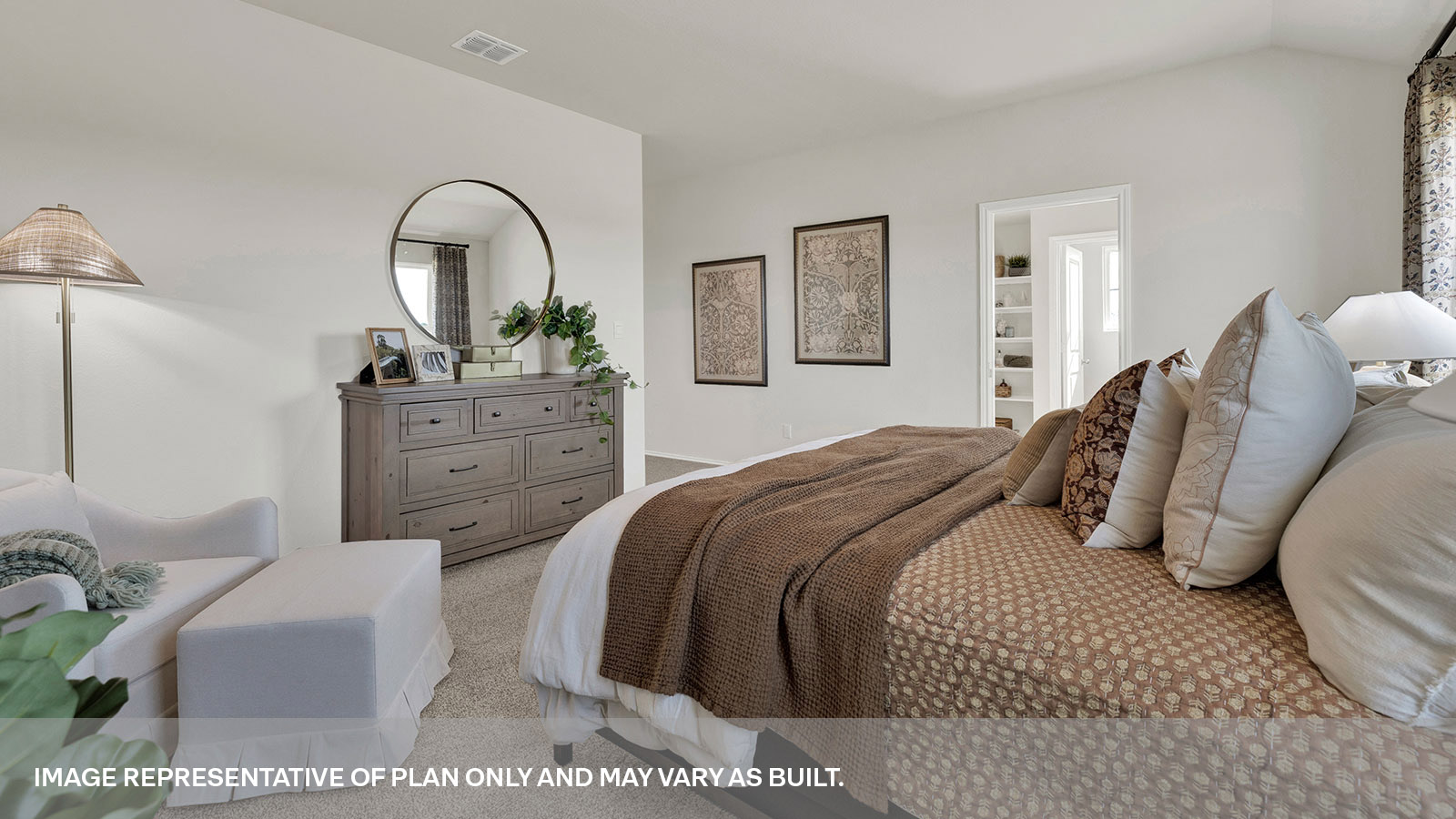 Main bedroom with carpeting and two windows.